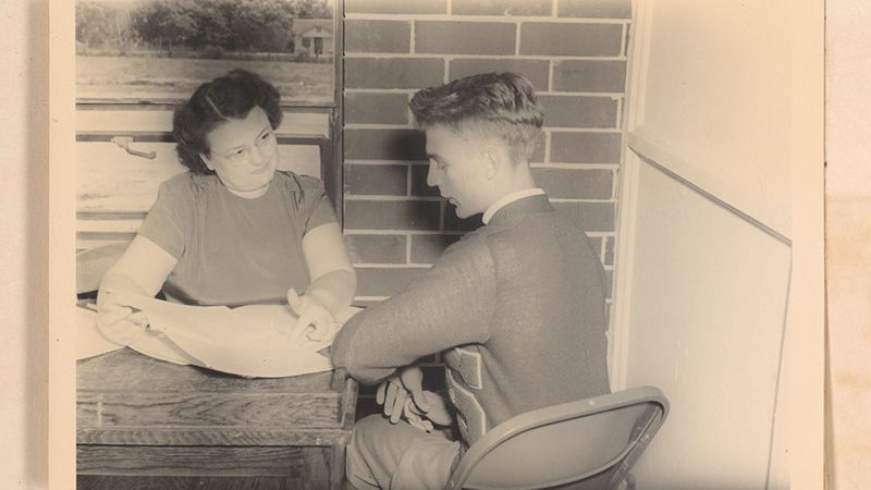 A high school guidance counselor meeting with a student in Sylvania, Georgia, 1951